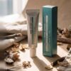 Pharmacian NMN30000 cream tube and box on linen